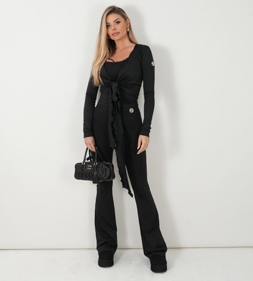 NEGATIV ** Czarne legginsy z rozkloszowaną nogawką dopasowane dzianina zdobienia suwaki madeinpoland premiummoda zloto