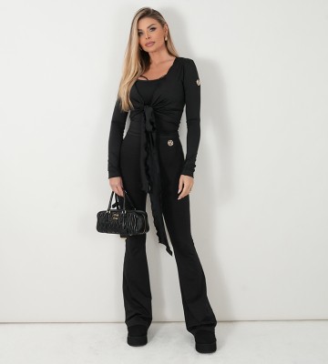 NEGATIV ** Czarne legginsy z rozkloszowaną nogawką dopasowane dzianina zdobienia suwaki madeinpoland premiummoda zloto